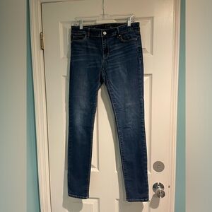 White House Black Market The Slim. Size 6. Medium wash.